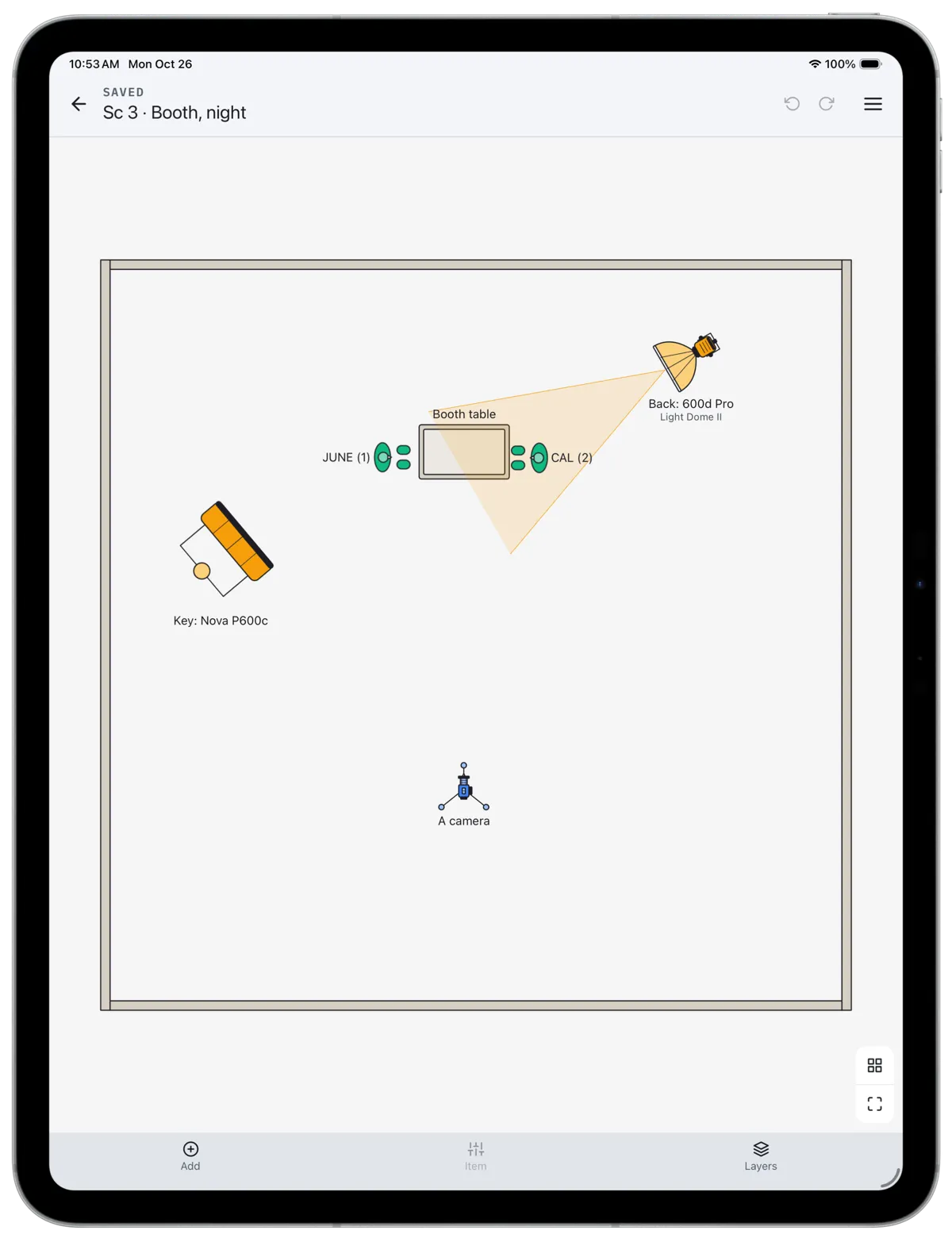 A CineFlo lighting diagram on iPad for a diner booth scene: two actors at a table, a Nova P600c key, an Aputure 600d Pro backlight with its 40° beam drawn, and the A camera on a tripod.